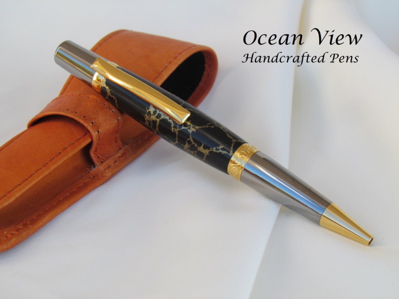 Handcrafted black and gold TruStone ballpoint Wall Street pen in gold/titanium
